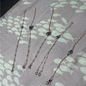 Sophisticated Tahitian Pearl with 14kt Goldfill  hand chain.